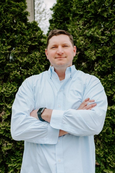 Headshot of American Landscaping Partners COO Eli Brenlove